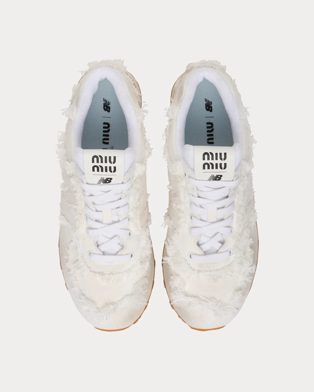 574 SL Low Baskets – White Edition